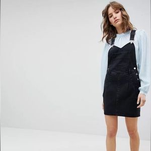 ASOS DESIGN denim overall dress in washed black with pleat detail